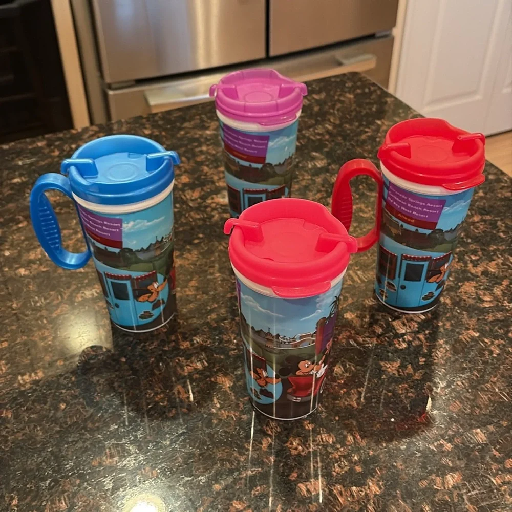 Set of 4 Walt Disney World Rapid Full Travel Mugs - Blue, Red, Pink, Purple